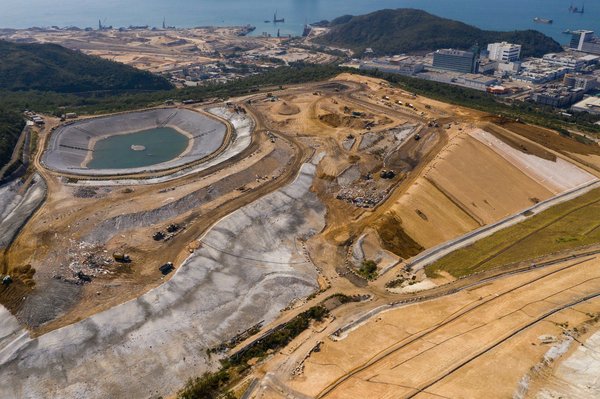 How Does the Presence of a Local Landfill Impact Property Insurance Premiums in the UK?